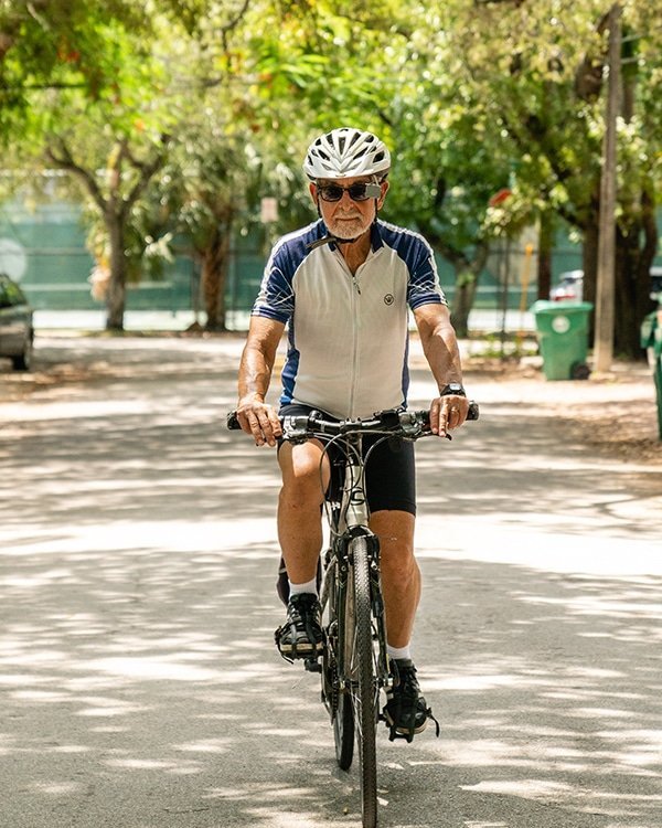 man riding bicycle helmet hank sanchez-resnik