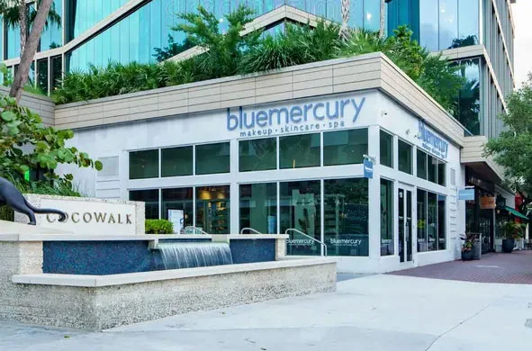 exterior of blue mercury building with Cocowalk sign