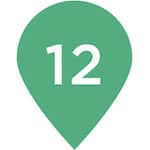 Light green map location icon with the number '12' in the middle. This illustrated icon provides indication of a location of a spot on a map.