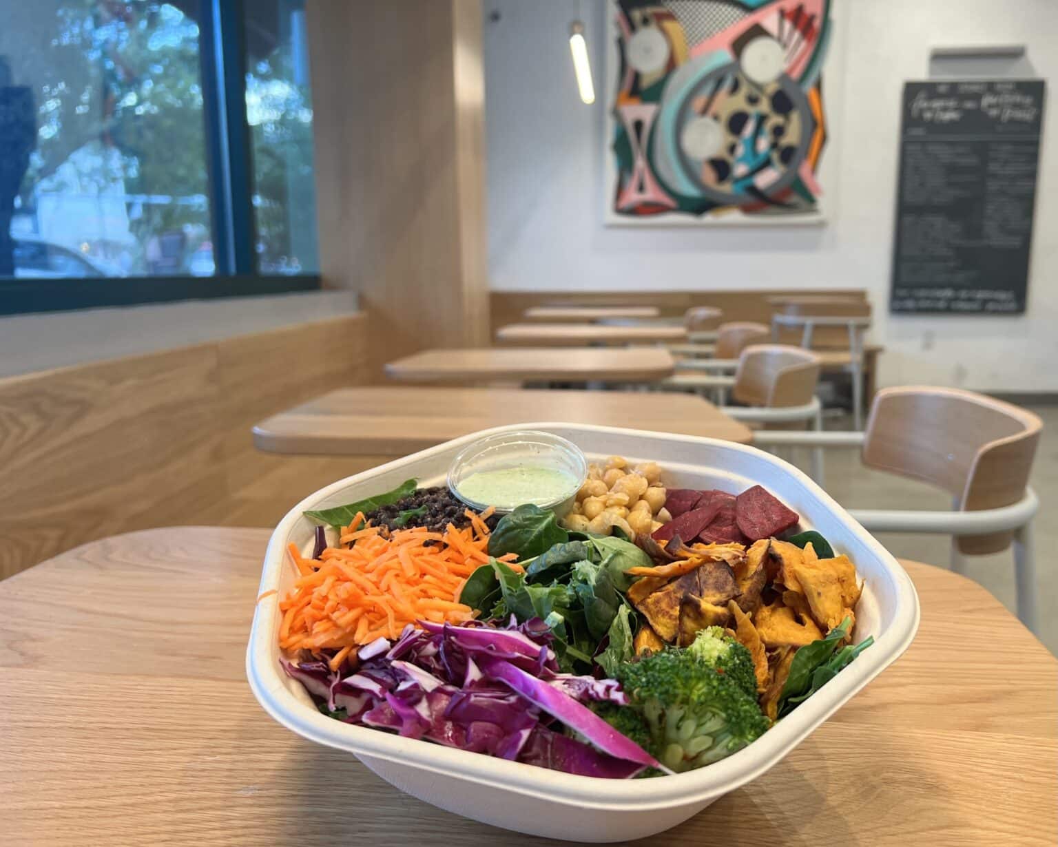 A bowl of colorful salad at Sweetgreen Coconut Grove