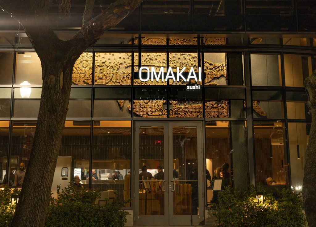 glass front doors of Omakai restaurant