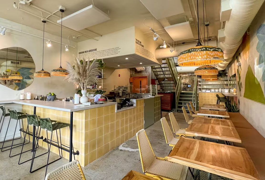 The inside of Los Felix seating area and register.