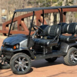 Gray and black golf cart with four seats.